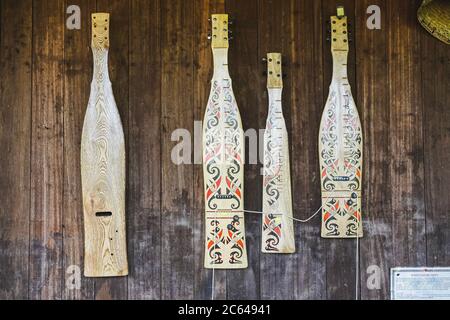 The sape' (sampek, sampeh, sapek) is a traditional lute of many of the Orang Ulu or 'upriver people', mainly the 'Kayan' and 'Kenyah' community who li Stock Photo