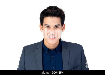 Young millennial handsome Asian man in business look smiling isolated on white background Stock Photo