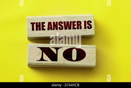The answer is No on Wooden Blocks on yellow. Business or relationship concept