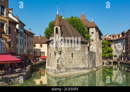 Annecy, Haute-Savoie department, Rhone-Alpes, France.  The 12th century castle Palais de l'Isle in the middle of the Thiou river. Stock Photo