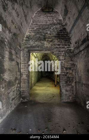 hallway in an abandoned industrial building Stock Photo