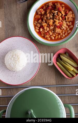 Hot turkish bean stew with a tasty tomato sauce, Turkish Food; Kuru Fasulye.. Stock Photo