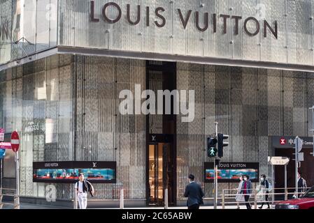Pedestrians are seen in front of a French luxury fashion brand Louis Vuitton  (LV) store in Hong Kong. (Photo by Budrul Chukrut / SOPA Images/Sipa USA  Stock Photo - Alamy