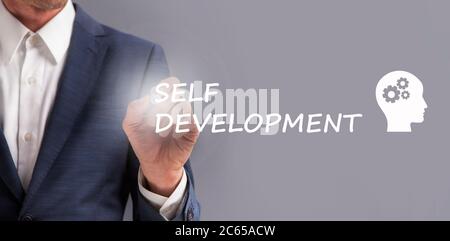 Businessman Writing Self Development Text Over Gray Background, Panorama, Collage Stock Photo