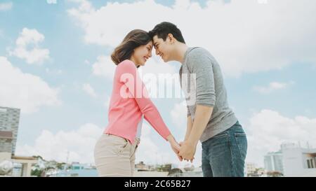 Young Asian Couple in love and holding their hands. Stock Photo