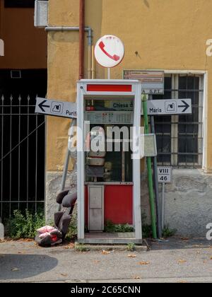 Old italian public telephone sign Stock Photo - Alamy