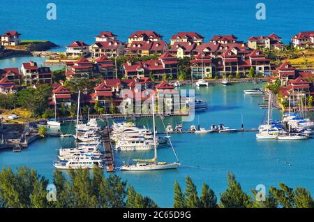 SEYCHELLES - JULY 6: An evening aerial view on the luxury district of the Victoria capital, village and marina of Eden island on July 06, 2011 in Mahe Stock Photo