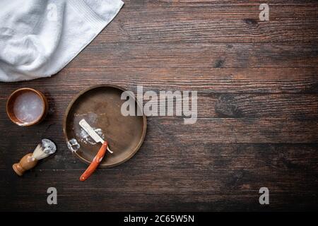 Traditional Shaving Flat Lay on a Dark Wood Table Stock Photo