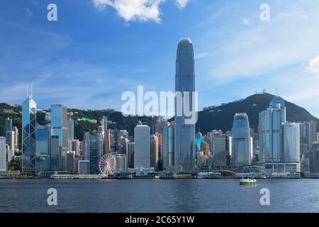 Skyline of Hong Kong Island and Star Ferry, Hong Kong Stock Photo