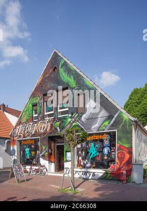 Colorfully painted house facade, shopping street Bahnhofstraße, Delmenhorst, Lower Saxony, Germany, Europe Stock Photo