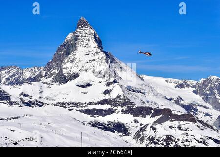 Matterhorn and helicopter from Gornergart, Zermatt, Switzerland Stock Photo