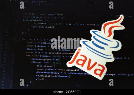 Moscow, Russia - 1 June 2020: Java logo sign with program code on background Illustrative Editorial Stock Photo