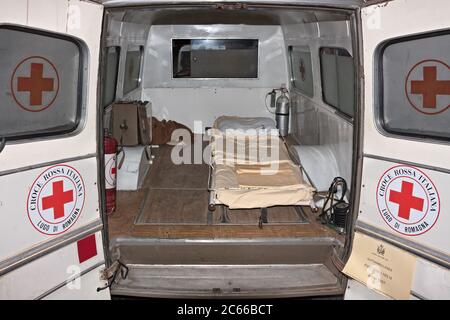 Interior of vintage italian ambulance Fiat 1100 (1957) exposed in festival Fiera di San Rocco on November 6, 2011 in Faenza, RA, Italy Stock Photo