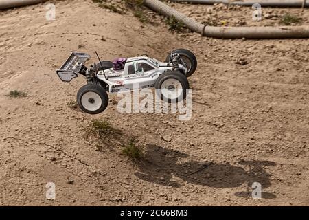 radio controlled buggy car model, internal combustion engine scale 1/8 off road, in dirt track Il Pozzo during the regional race AMSCI, April 26, 2015 Stock Photo