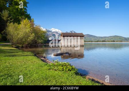 Boathouses on the Kochelsee behind the Heimgarten, Kochel am See, Tölzer Land, Upper Bavaria, Bavaria, southern Germany, Germany, Europe Stock Photo