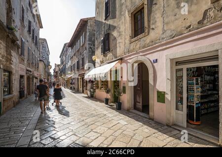 Narrow street in the old town of Pore?, Istrian peninsula, Croatia Stock Photo