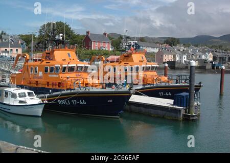 RNLI Severn Class all weather  lifeboats the Margaret Joan and Fred Nye and RNLI Lifeboat Annette Hutton  moored at Castletownbere Lifeboat Station. Stock Photo