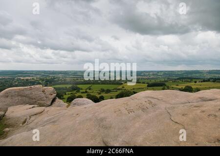 Almscliffe Crag, or Almscliff Crag is a Millstone Grit outcrop at the top of a small hill near the village of North Rigton,near Leeds and Harrogate Stock Photo