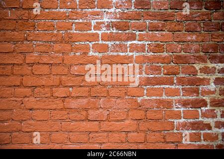 Yellow brick wall texture with dark inter layers  Stock Photo