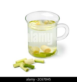 Glass cup of refreshing lemongrass tea isolated on white background Stock Photo