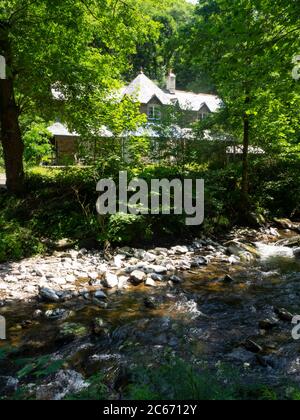 Watersmeet House a former fishing lodge built in 1832, Watersmeet, Devon, UK Stock Photo