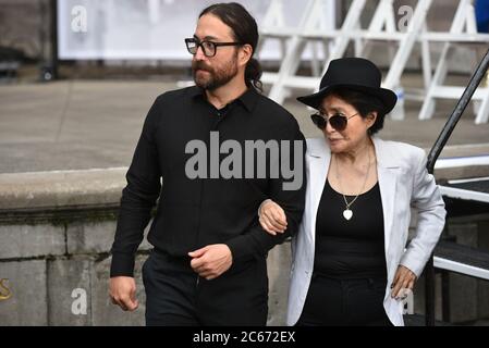 Yoko Ono and Sean Lennon attend a John Lennon stamp dedication ceremony at the Naumburg Bandshell in Central Park on September 7, 2018 in New York. Stock Photo