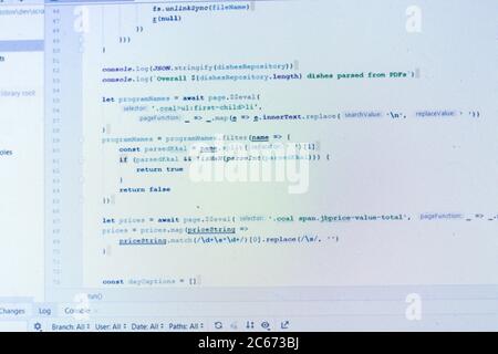Program code on white background. PC screen close-up. IT concept. Real Software script on display. Freelance Develop Stock Photo
