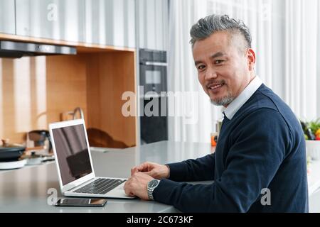 Home office in middle-aged men Stock Photo