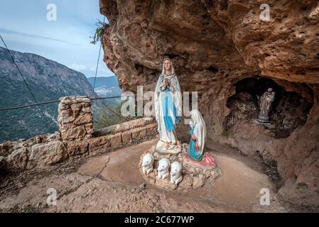 Statue in Hermitage of Our Lady of Hawqa in Kadisha Valley also called Holy Valley in North Governorate of Lebanon Stock Photo