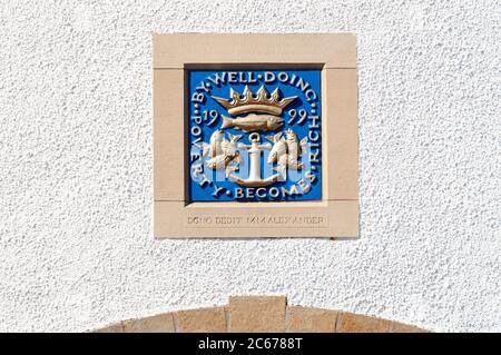Coat of arms on a plaque outside the Scottish Fisheries Museum in Anstruther, East Neuk of Fife, Scotland. Stock Photo