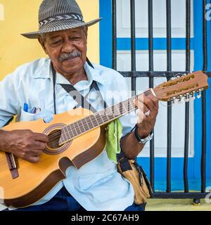 Elderly man playing traditional cuban music in Old Havana Stock Photo