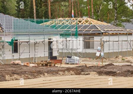 Gifhorn, Germany, May 15., 2020: Construction site for several small detached houses in close proximity Stock Photo
