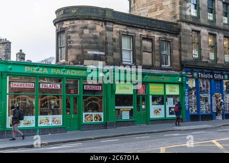 Pizza Paradise and Thistle Gifts shop on South Bridge street in Edinburgh, the capital of Scotland, part of United Kingdom Stock Photo