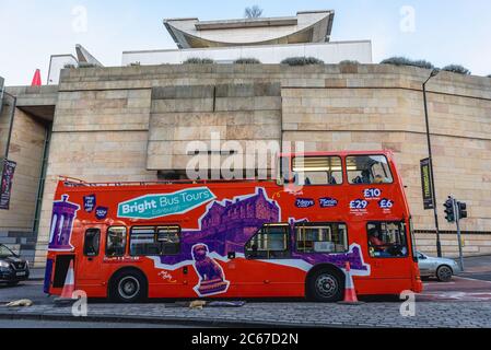 Bright Bus Tours in front of National Museum of Scotland Edinburgh, the capital of Scotland, part of United Kingdom Stock Photo