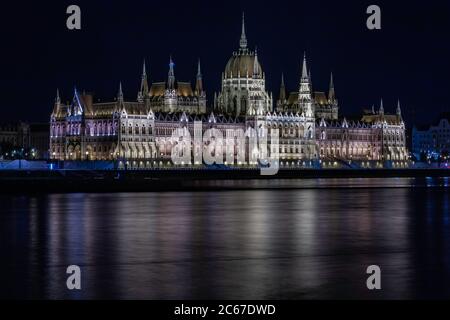 The Hungarian Parliament Building facing the Danube River as seen from Margaret Bridge Stock Photo