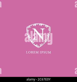 N Letter Intial logo design template. Luxury silver decorative floral shield illustration. Isolated on pink color background. Insurance, Beauty Stock Vector