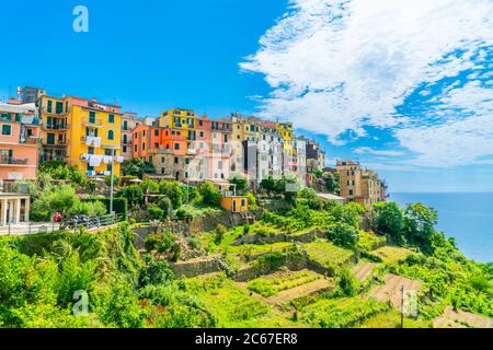 Cinque Terre, Italy - july 1st 2020 - Overview of the very quiet village Cornigli due to Corona, one of the towns known as Cinque Terre at the Medeter Stock Photo