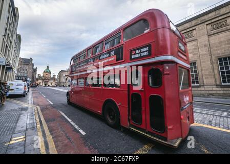 Red Bus Bistro classic tour bus on a street  in Edinburgh, the capital of Scotland, part of United Kingdom Stock Photo