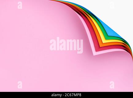 Stack of rainbow-colored paper sheets with curled corners. Multicolor blank pages with a folded corner. Many colorful pages with a rolled edge. Stock Photo