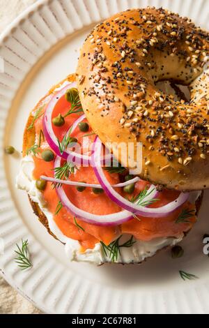 Homemade Bagel and Salmon Lox with Cream Cheese and Dill Stock Photo