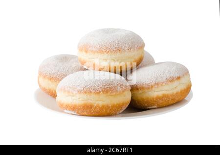 Traditional sweet donuts with powdered sugar and jam. Fat Thursday or Hanukkah celebration. Isolated on white. Stock Photo