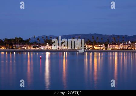 Illuminated Santa Barbara Pier at dusk, California, USA Stock Photo