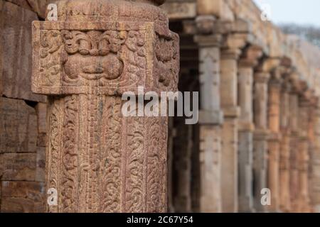 India, Delhi. Qutub Minar, circa 1193, one of earliest known samples of Islamic architecture. Detail of ornate carved sandstone. UNESCO. Stock Photo