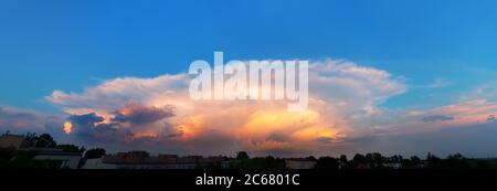 Panorama of huge storm clouds over the city Stock Photo