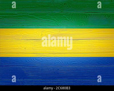Gabon flag painted on old wood plank background. Brushed wooden board texture. Wooden texture background flag of Gabon. Stock Photo