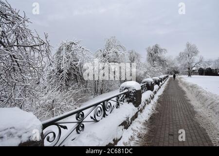 The riverside path in Queen Victoria Park during wintertime at Niagara Falls on the Canadian side.  Snow has been cleared from the pathway. Stock Photo