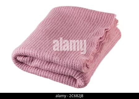 Closeup shot of knitted pink blanket isolated on white background. Stock Photo