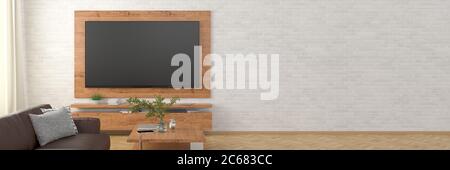 TV screen on the white brick wall with wooden plate above the cabinet in modern living room with couch and coffee table Stock Photo