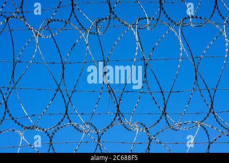Barbed wire against clear sky, France