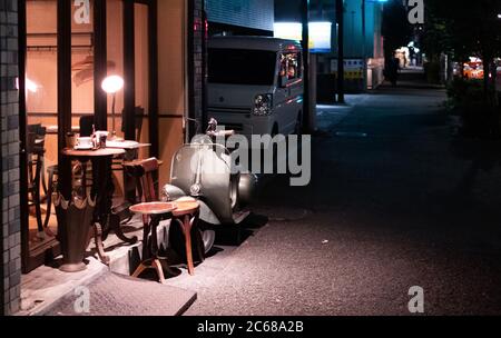 Old vespa motorcycle in the street sidewalk of Kamimeguro, Tokyo, Japan. Stock Photo